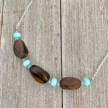 Load image into Gallery viewer, Tiger Ebony Necklace with Light Turquoise and Grey Crystals on a Silver Plated Chain