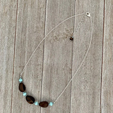 Load image into Gallery viewer, Tiger Ebony Necklace with Light Turquoise and Grey Crystals on a Silver Plated Chain