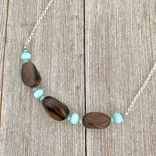 Load image into Gallery viewer, Tiger Ebony Necklace with Light Turquoise and Grey Crystals on a Silver Plated Chain