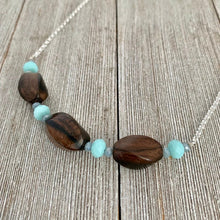 Load image into Gallery viewer, Tiger Ebony Necklace with Light Turquoise and Grey Crystals on a Silver Plated Chain