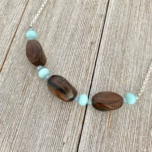 Load image into Gallery viewer, Tiger Ebony Necklace with Light Turquoise and Grey Crystals on a Silver Plated Chain