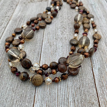 Load image into Gallery viewer, Three Strand Layered Necklace with Smoky Quartz, Bronzite, Bronze Fresh Water Pearls, Faceted Glass, 24k Plated Spacers, and Toggle Clasp