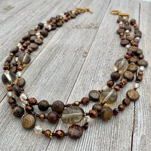 Load image into Gallery viewer, Three Strand Layered Necklace with Smoky Quartz, Bronzite, Bronze Fresh Water Pearls, Faceted Glass, 24k Plated Spacers, and Toggle Clasp