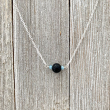 Load image into Gallery viewer, Black Lava Diffuser Necklace, Misty Blue Crystals, Silver Chain
