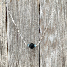 Load image into Gallery viewer, Black Lava Diffuser Necklace, Misty Blue Crystals, Silver Chain