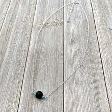 Load image into Gallery viewer, Black Lava Diffuser Necklace, Misty Blue Crystals, Silver Chain