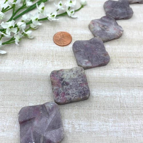 Carved Large Purple Stone