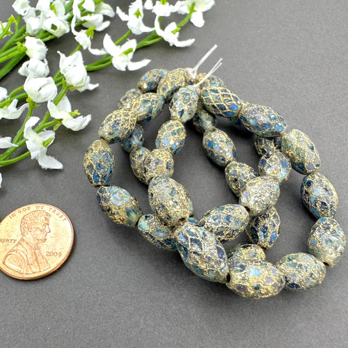 12x8mm Faceted Oval Sapphire and Teal with a Picasso Finish and Gold Wash