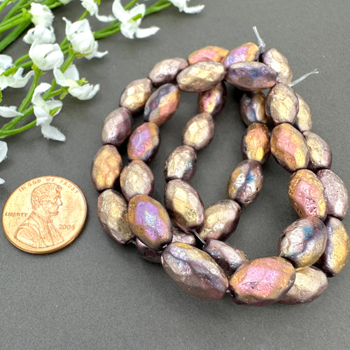 12x8mm Faceted Oval Copper Rainbow with an Etched Finish and a Metallic Pink Wash