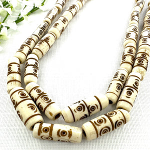 White with Brown 8x25mm Carved Bone Tubes