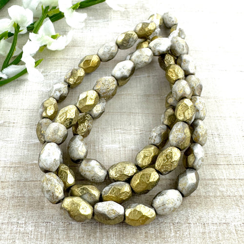 7x5mm Faceted Oval Pale Grey with Etched and Gold Finishes