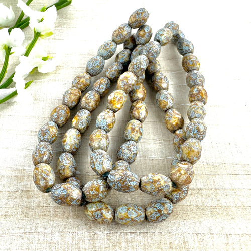 7x5mm Faceted Oval Honey with Picasso Finish and Turquoise Wash