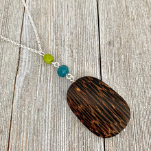 Load image into Gallery viewer, Long Chain Necklace / Old Palmwood Pendant / Olive Green Czech Glass / Teal Crystals
