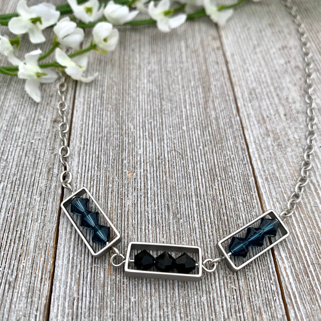 Montana Blue and Jet Swarovski Crystals, Matte Silver Frames, Antique Silver Chain Necklace