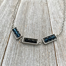 Load image into Gallery viewer, Montana Blue and Jet Swarovski Crystals, Matte Silver Frames, Antique Silver Chain Necklace
