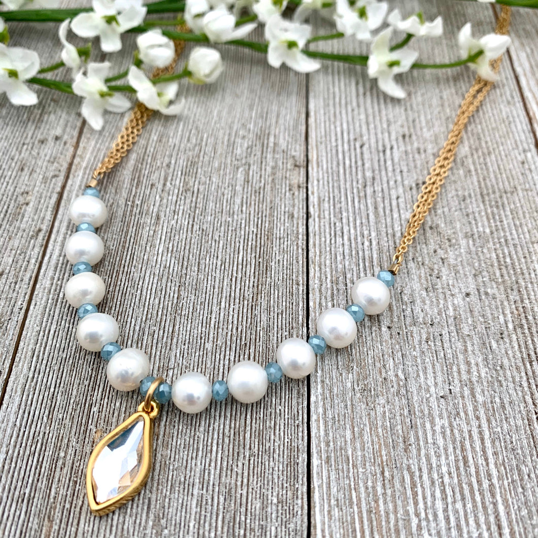 White FWP, Lt Blue Tiny Crystals, Gold Swarovski Flame Charm, Necklace