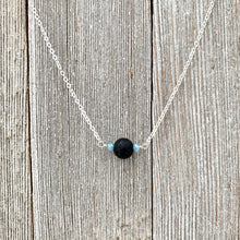Load image into Gallery viewer, Black Lava Diffuser Necklace, Misty Blue Crystals, Silver Chain
